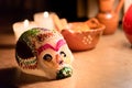 Sugar skull and candles - Calaverita - Ofrenda Dia de muertos Royalty Free Stock Photo