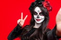 Sugar skull makeup on happy Halloween party Royalty Free Stock Photo