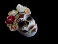 Sugar skull mask with flowers used for celebrating Day of the Dead in hispanic culture