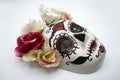 Sugar skull mask with flowers used for celebrating Day of the Dead in hispanic culture