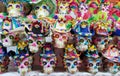 sugar skulls decorated in a traditional mexican market to celebrate day of the dead