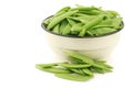 Sugar snaps in an enamel bowl