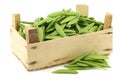 Sugar snaps in a wooden crate