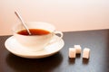 Sugar with tea in a white cup Royalty Free Stock Photo