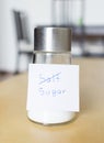 Sugar text on salt shaker Royalty Free Stock Photo