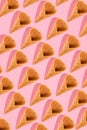 Sugar waffle cone for ice cream arranged in pattern on pink background. The image with copy space can be used as a Royalty Free Stock Photo