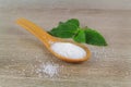 Sugar in a wooden spoon