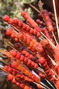 Sugarcoated haws on a stick