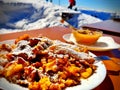 Sugared pancake with raisins and apple puree