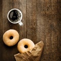 Sugared ring doughnut with espresso coffee