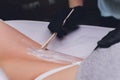 Sugaring: epilation with liquate sugar at armpit. It is less painful hair removal with wax replacement. Royalty Free Stock Photo