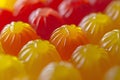 Sugary jelly candies in the shape of citrus fruits, glowing in warm, sunny colors