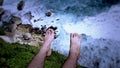 suicidal young man at the edge of cliff, retouched