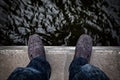 Suicide concept., Depressed young man looking down at his shoe Royalty Free Stock Photo