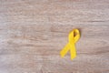 Suicide prevention and Childhood Cancer Awareness, Yellow Ribbon for supporting people living and illness. children Healthcare and Royalty Free Stock Photo