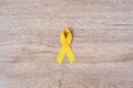 Suicide prevention and Childhood Cancer Awareness, Yellow Ribbon for supporting people living and illness. children Healthcare and Royalty Free Stock Photo