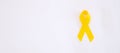 Suicide prevention and Childhood Cancer Awareness, Yellow Ribbon for supporting people living and illness. children Healthcare and Royalty Free Stock Photo