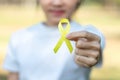 Suicide prevention, Sarcoma, bone, bladder, Childhood cancer Awareness month, Yellow Ribbon for supporting people living and Royalty Free Stock Photo