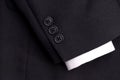 A suit sleeve with a white cuff Royalty Free Stock Photo