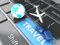 suitcase, airplane and earth on computer keyboard. Travel concept Royalty Free Stock Photo