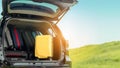 Suitcase backpack in SUV car truck for packing travel driving Royalty Free Stock Photo