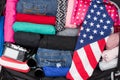 Suitcase, clothing and flag Royalty Free Stock Photo