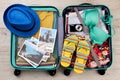 Suitcase full of beach accessories. Royalty Free Stock Photo