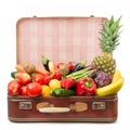 Suitcase full of fruit and vegetables Royalty Free Stock Photo