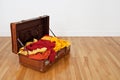 Suitcase full of orange and yellow clothing Royalty Free Stock Photo