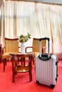 Suitcase in the hotel room Royalty Free Stock Photo