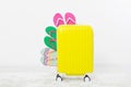 Suitcase isolated on white background Summer holidays. summer flip flops or slippers.Sandals beach.Red cap.Travel valise or bag. M Royalty Free Stock Photo