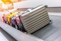 Suitcase or luggage with conveyor belt in the airport Royalty Free Stock Photo