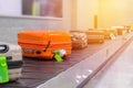 Suitcase or luggage with conveyor belt in the airport Royalty Free Stock Photo