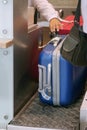 check-in at the airport. The airport employee registers the luggage. Royalty Free Stock Photo