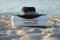 suitcase old is more white also a black hat Royalty Free Stock Photo