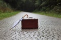 Suitcase old and an umbrella Royalty Free Stock Photo