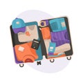 Suitcase with packed clothes for travel in top view