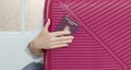 Suitcase pink passport Romanian hand woman big luggage baggage hat summer door