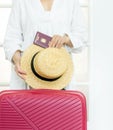 Suitcase pink passport Romanian hand woman big luggage baggage hat summer door