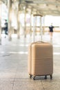 Suitcases in airport departure lounge, airplane in background, s Royalty Free Stock Photo