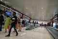 Suitcases or baggage on luggage conveyor belt in arrivals lounge of airport terminal. Selective focus. Luggage track at an airport