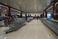 Suitcases or baggage on luggage conveyor belt in arrivals lounge of airport terminal. Selective focus. Luggage track at an airport