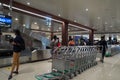 Suitcases or baggage on luggage conveyor belt in arrivals lounge of airport terminal. Selective focus. Luggage track at an airport