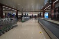 Suitcases or baggage on luggage conveyor belt in arrivals lounge of airport terminal. Selective focus. Luggage track at an airport