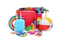 Suitcases, bright kite, inflatable ring and other beach accessories isolated on white Royalty Free Stock Photo