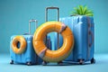 Suitcases with inflatable ring and beach accessories on blue background. Royalty Free Stock Photo