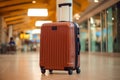Suitcases with luggage in airport departure lounge with airplane in background. Traveler suitcases in airport terminal waiting Royalty Free Stock Photo