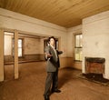 Suited man in Abandoned Home