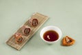 Sujeonggwa - Korean punch with cinnamon and dried persimmons. Dark reddish brown in color, it is made from gotgam dried persimmon