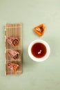 Sujeonggwa - Korean punch with cinnamon and dried persimmons. Dark reddish brown in color, it is made from gotgam dried persimmon